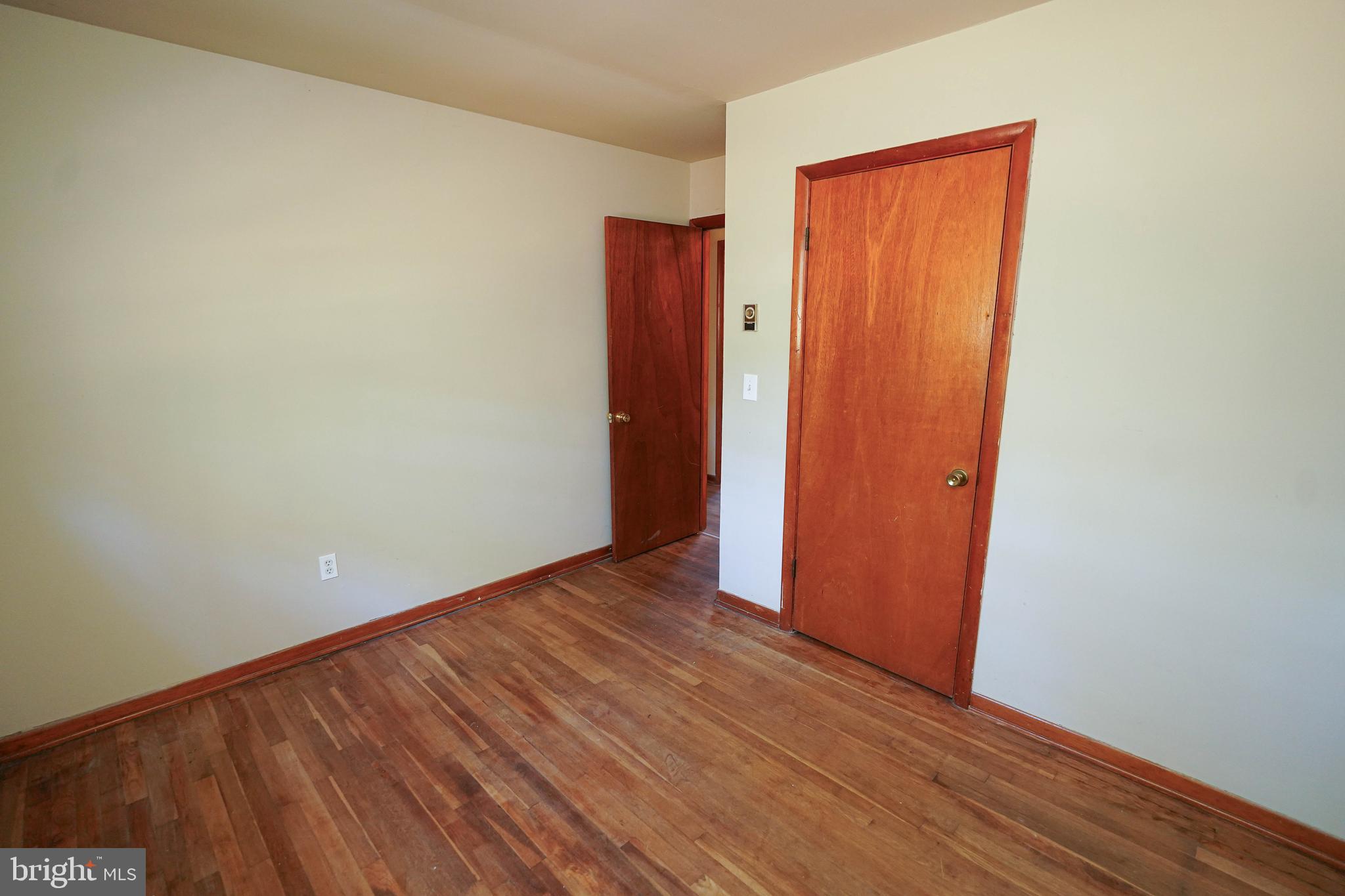 5643 Rip Wil Drive Salisbury, MD 21804 - Photo 33 of 34 a view of an empty room with wooden floor and closet