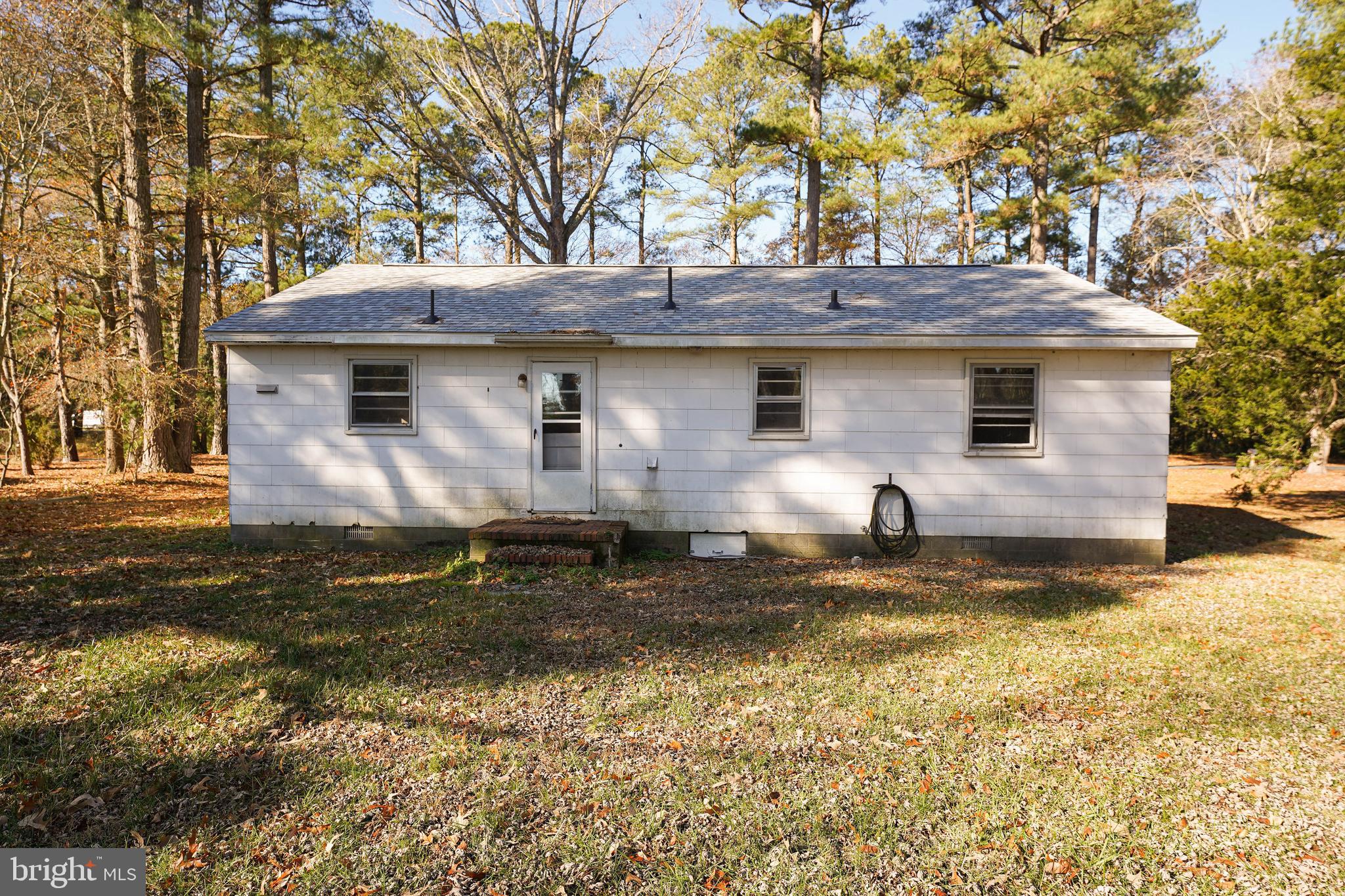 5643 Rip Wil Drive Salisbury, MD 21804 - Photo 4 of 34 a front view of a house with a yard