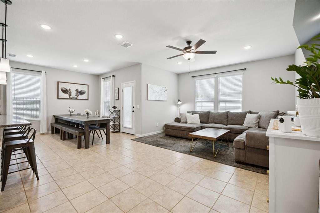 2448 Jack Rabbit Way Northlake, TX 76247 - Photo 17 of 40 a living room with furniture and a large window