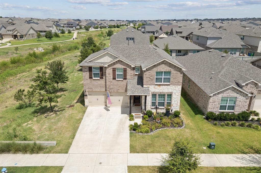 2448 Jack Rabbit Way Northlake, TX 76247 - Photo 29 of 40 an aerial view of a house with a garden