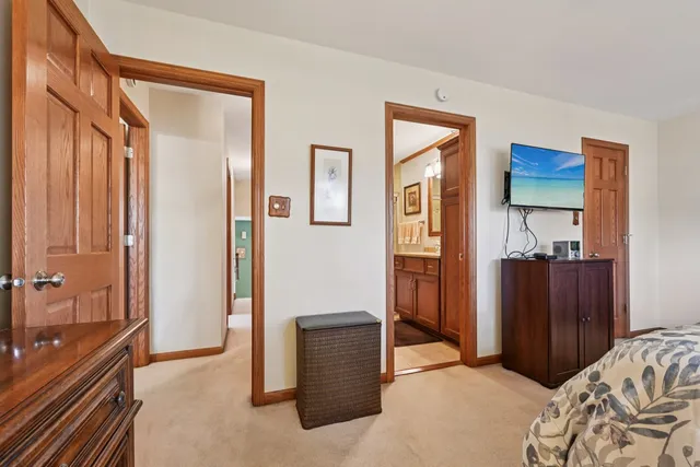 a bedroom with a bed and furniture