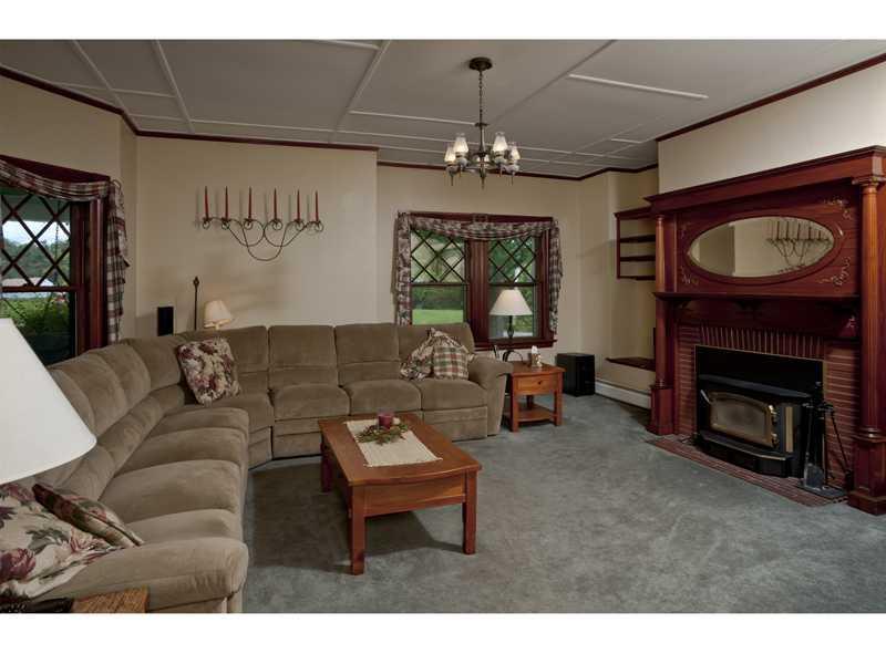 105 Cider Hill Road York, ME 03909 - Photo 9 of 29 Living Room. A fireplace insert...