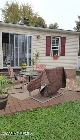 a bathroom with a toilet a sink and a shower