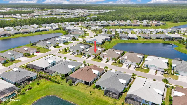 an aerial view of a houses with outdoor space