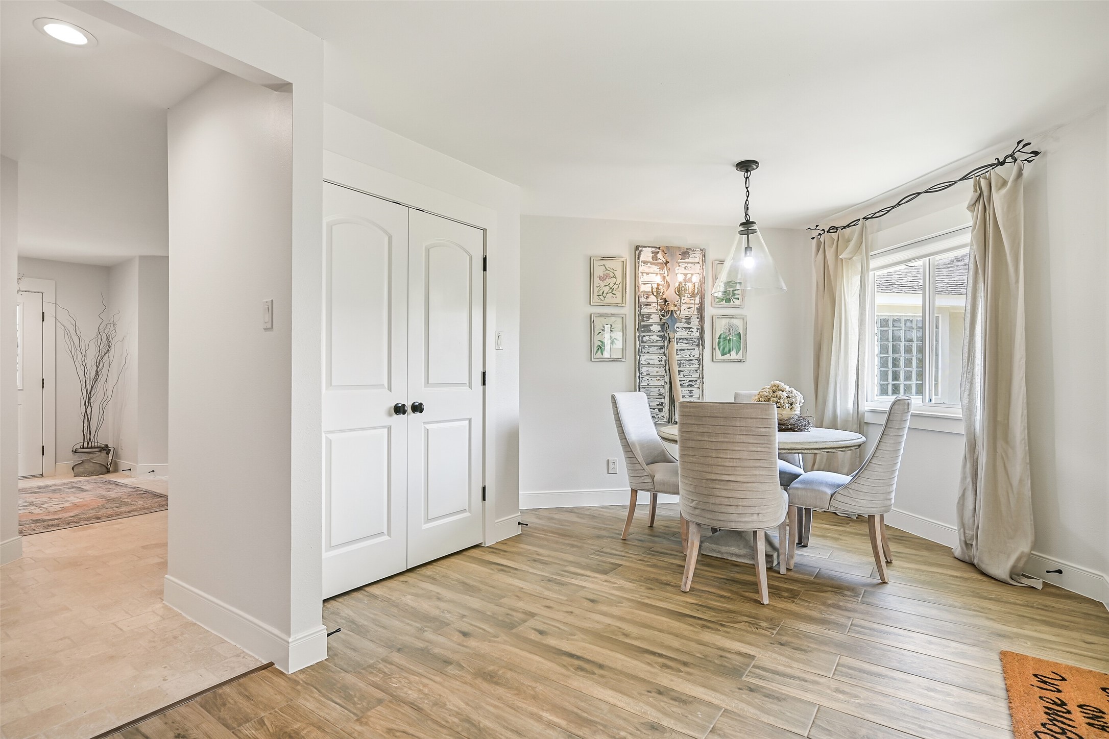3042 Poskey Road Anahuac, TX 77514 - Photo 15 of 50 a view of a dining room with furniture and wooden floor