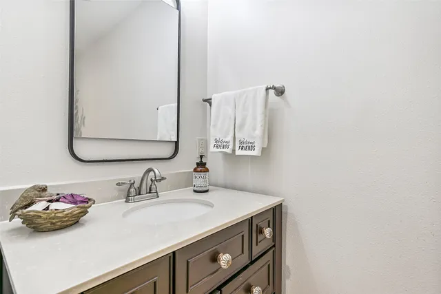 a kitchen with stainless steel appliances granite countertop a stove and a sink