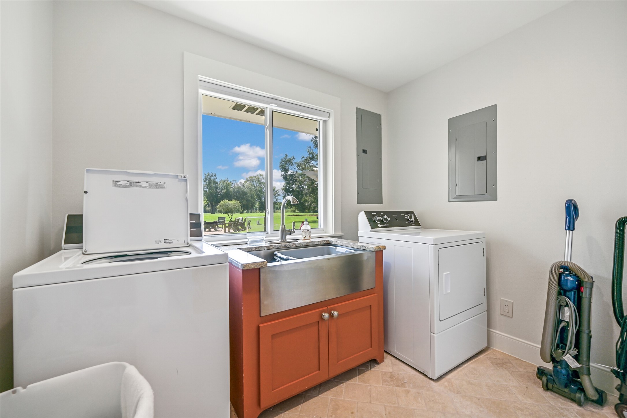3042 Poskey Road Anahuac, TX 77514 - Photo 18 of 50 a room with sink washer and dryer