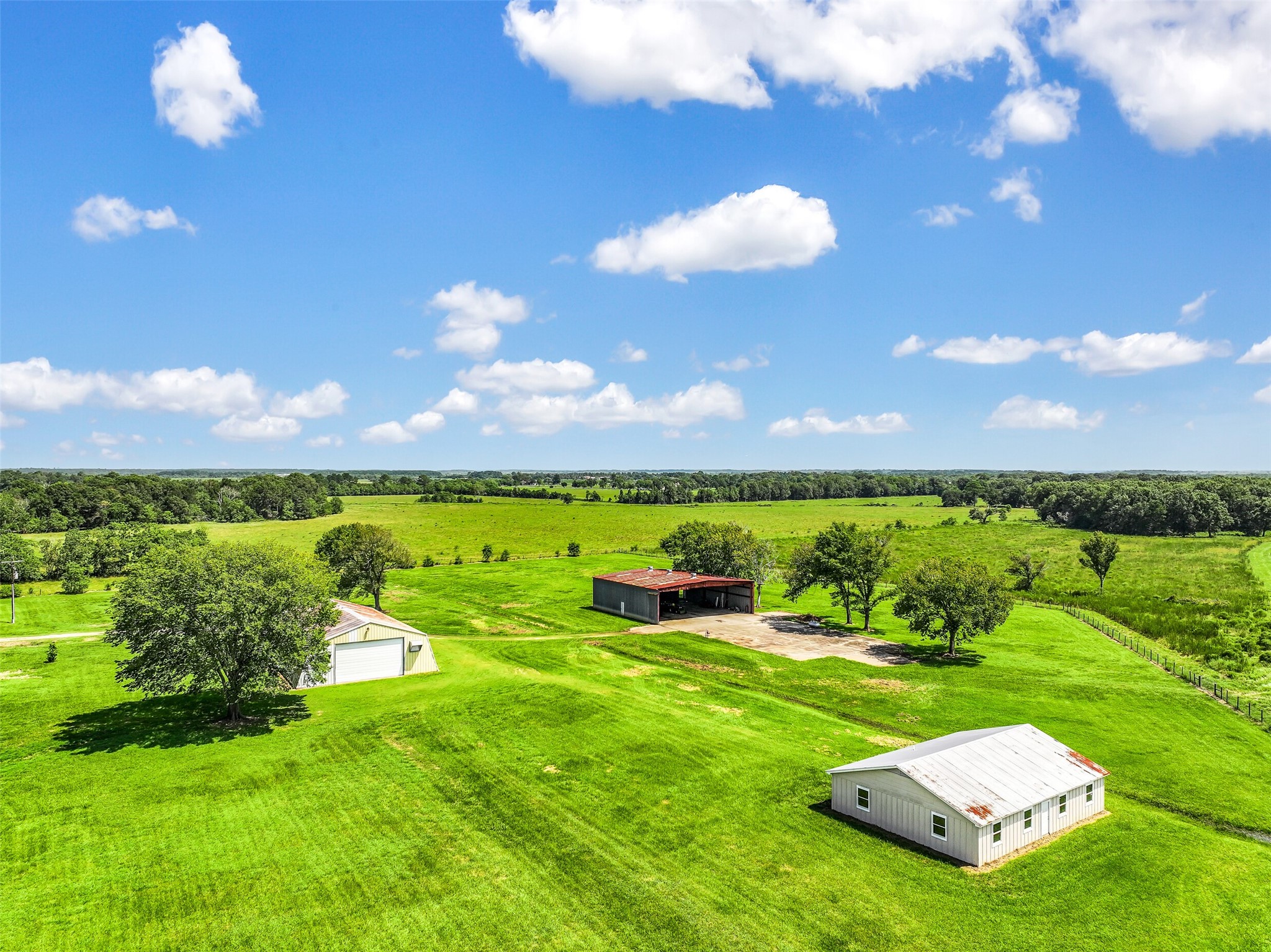 3042 Poskey Road Anahuac, TX 77514 - Photo 7 of 50 a view of a golf course with a lake