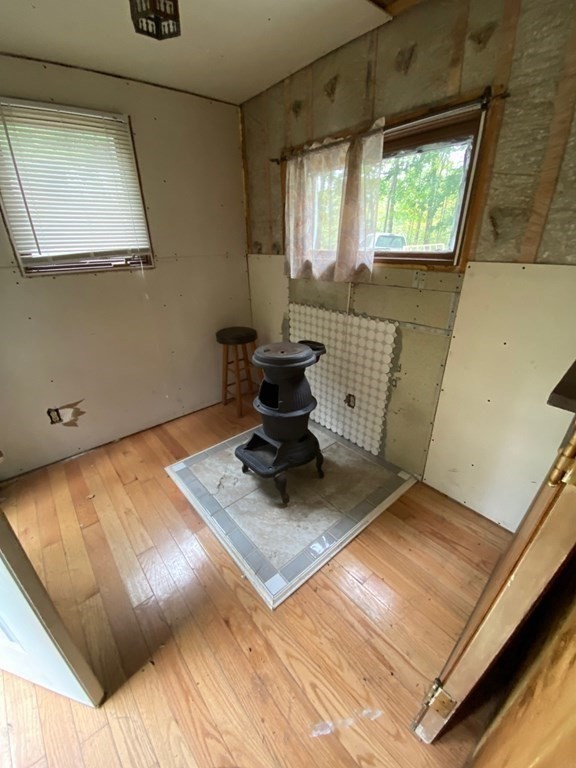 9 Deer Run Path Heath, MA 01346 - Photo 11 of 32 a view of a living room with a bed and a window