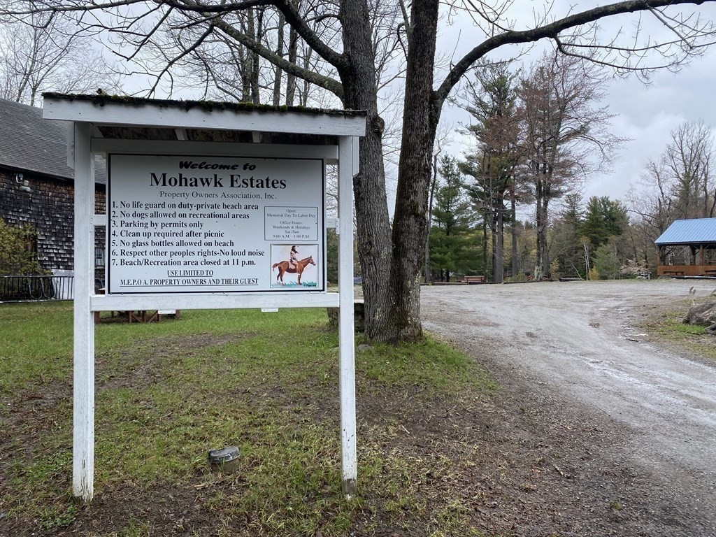 9 Deer Run Path Heath, MA 01346 - Photo 22 of 32 a view of a wooden door in front of a house