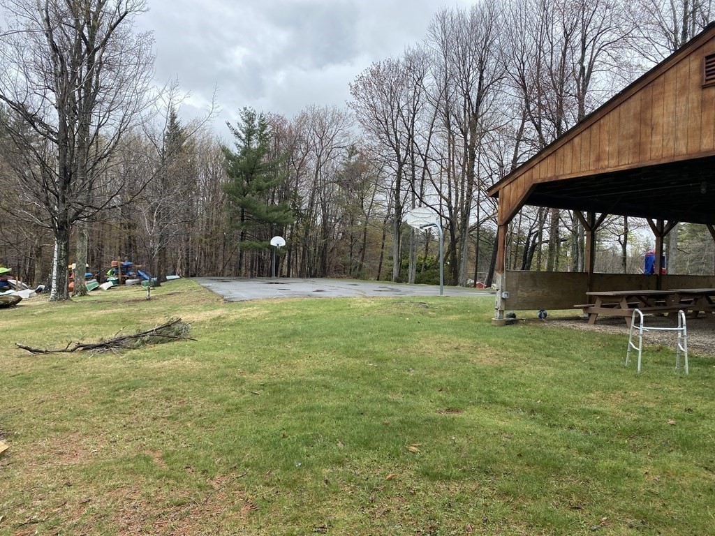 9 Deer Run Path Heath, MA 01346 - Photo 29 of 32 a swimming pool with outdoor seating and yard