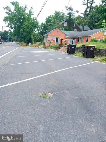 a view of a house with a street