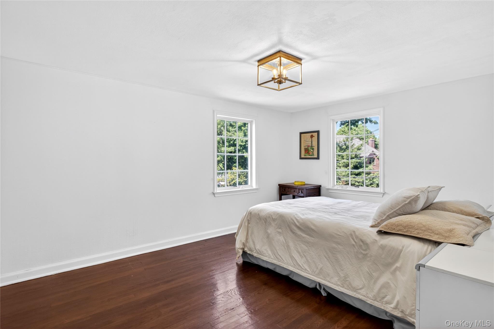60 Mill Spring Road Manhasset, NY 11030 - Photo 17 of 18 a bedroom with a bed and a window