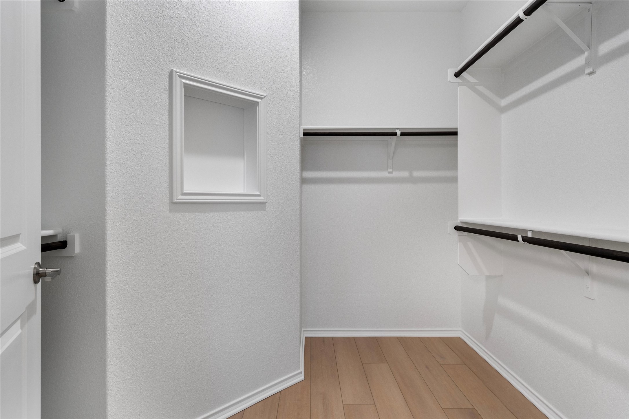 310 Livewater Lane Georgetown, TX 78633 - Photo 23 of 33 a view of walk in closet with empty racks