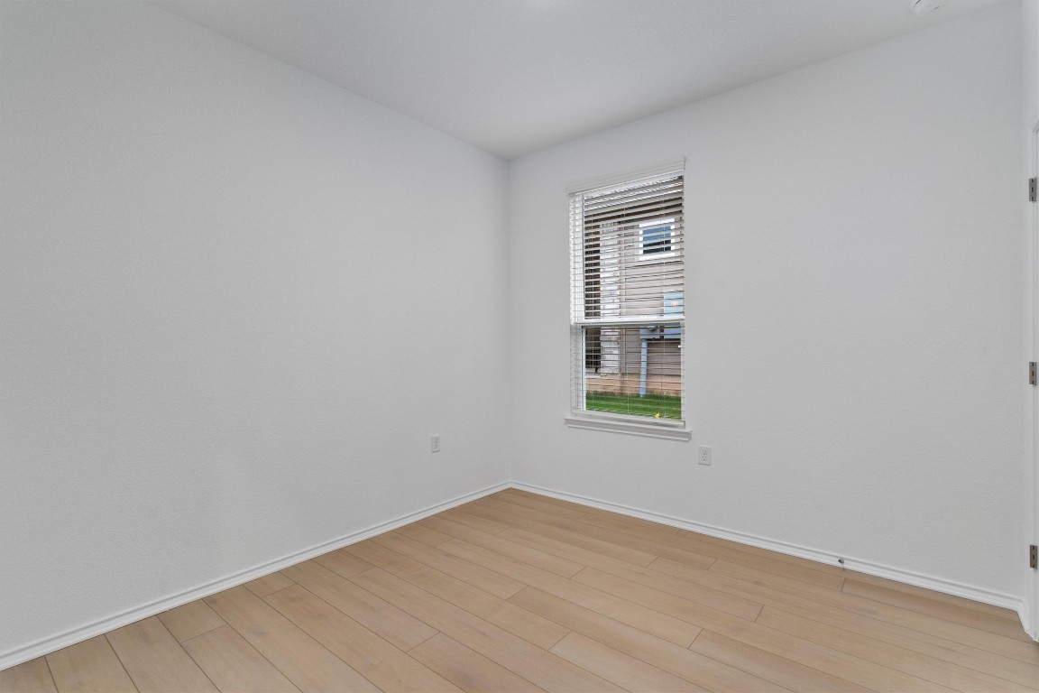 310 Livewater Lane Georgetown, TX 78633 - Photo 24 of 33 an empty room with a window