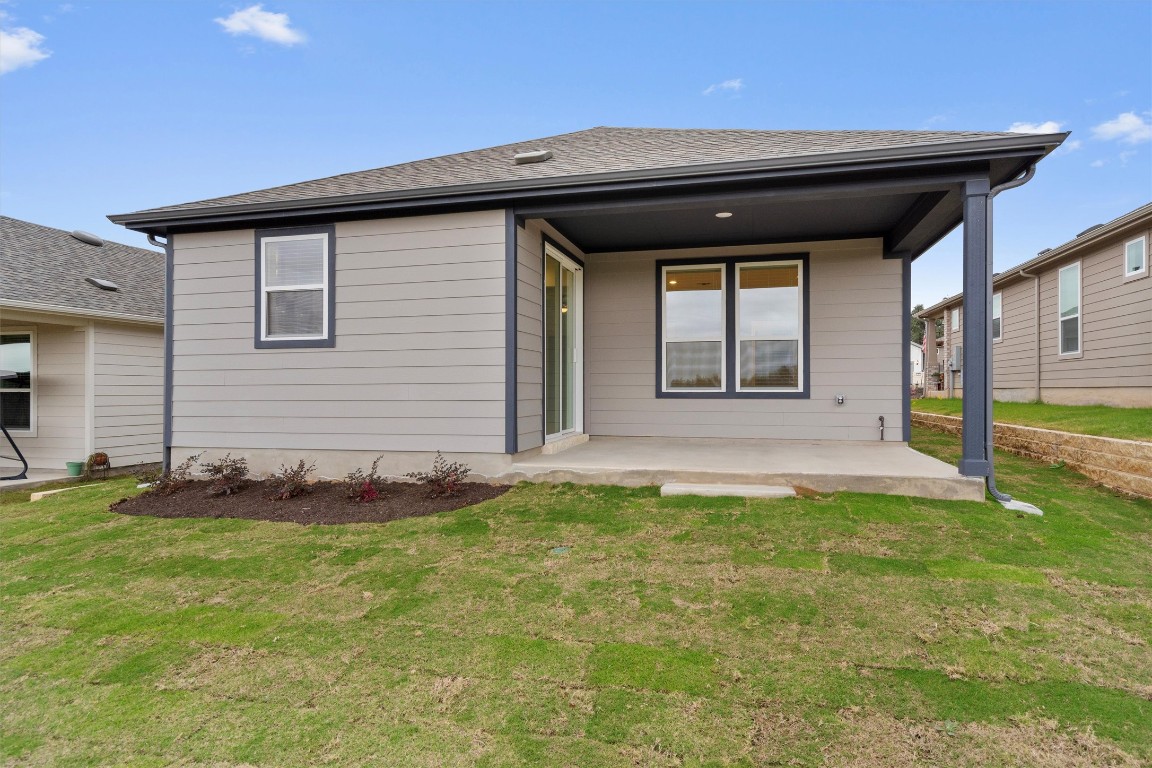 310 Livewater Lane Georgetown, TX 78633 - Photo 29 of 33 a front view of a house with a yard