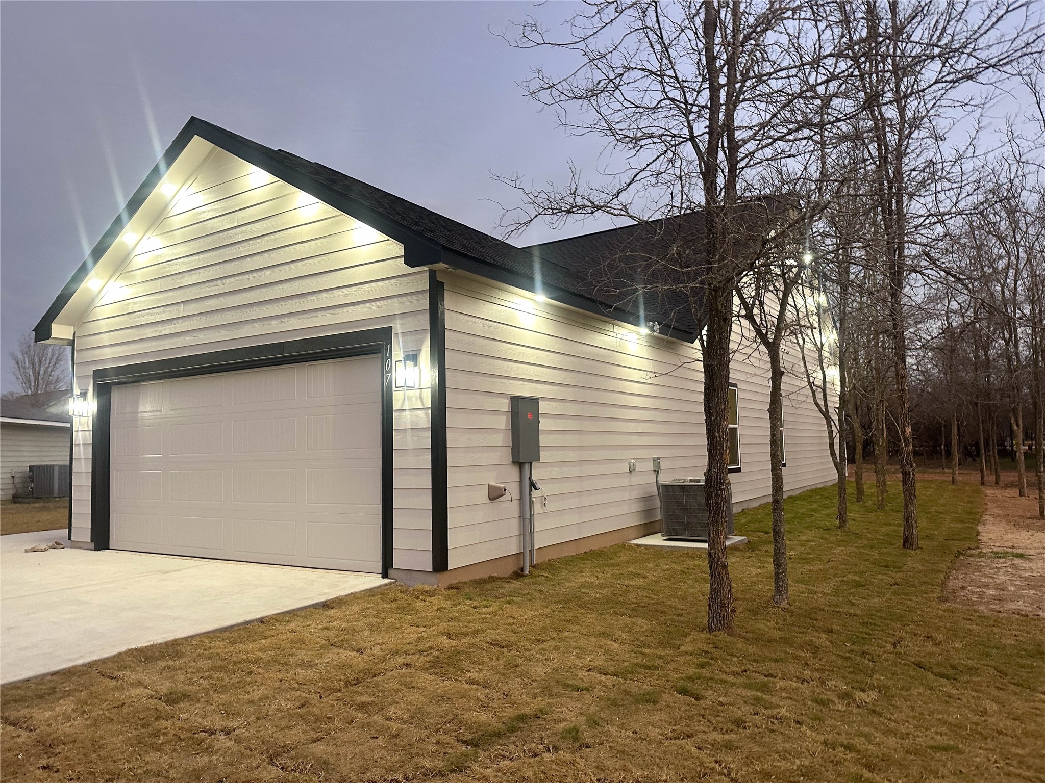 107 Keahi Court Bastrop, TX 78602 - Photo 9 of 28 a view of a house with a yard