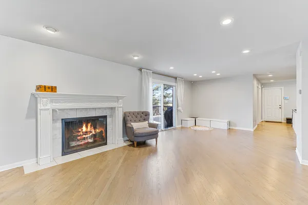 a view of a living room and kitchen with furniture and a kitchen view
