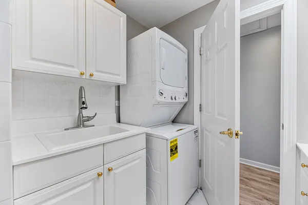 a bathroom with a sink double vanity and a mirror