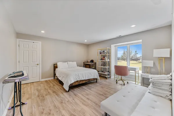 a kitchen with stainless steel appliances a stove a sink and a refrigerator