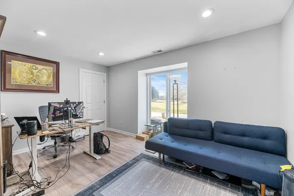 a view of a stove top oven and cabinets