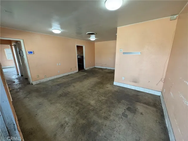 en empty room with windows