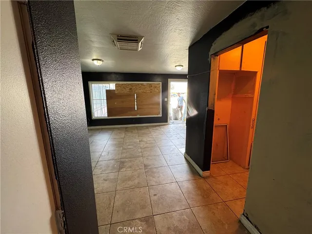 an empty room with an entryway