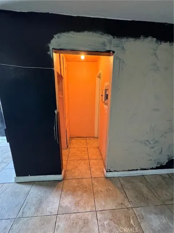 an empty room with cabinet