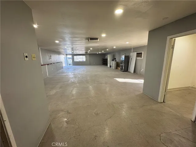 a view of a large hall with yard