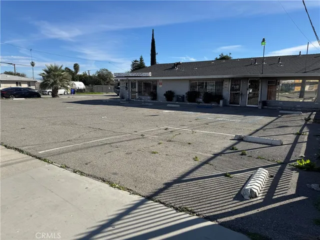 a view of a balcony with furniture