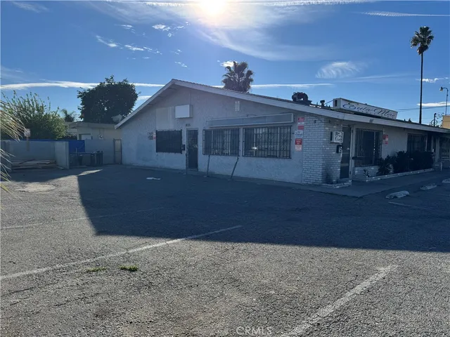 a view of a house with a street