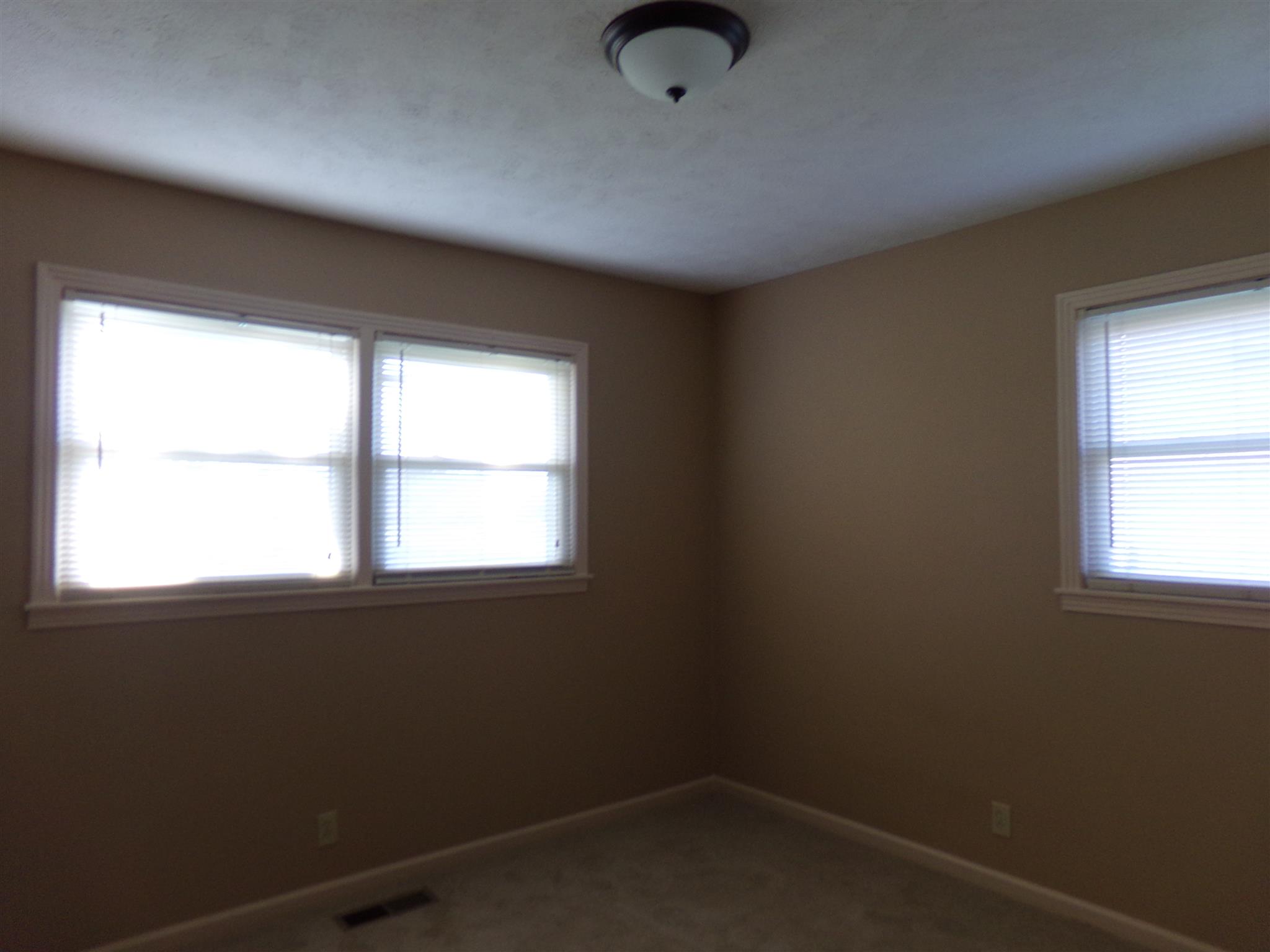 213 Airport Road Portland, TN 37148 - Photo 16 of 16 an empty room with a window