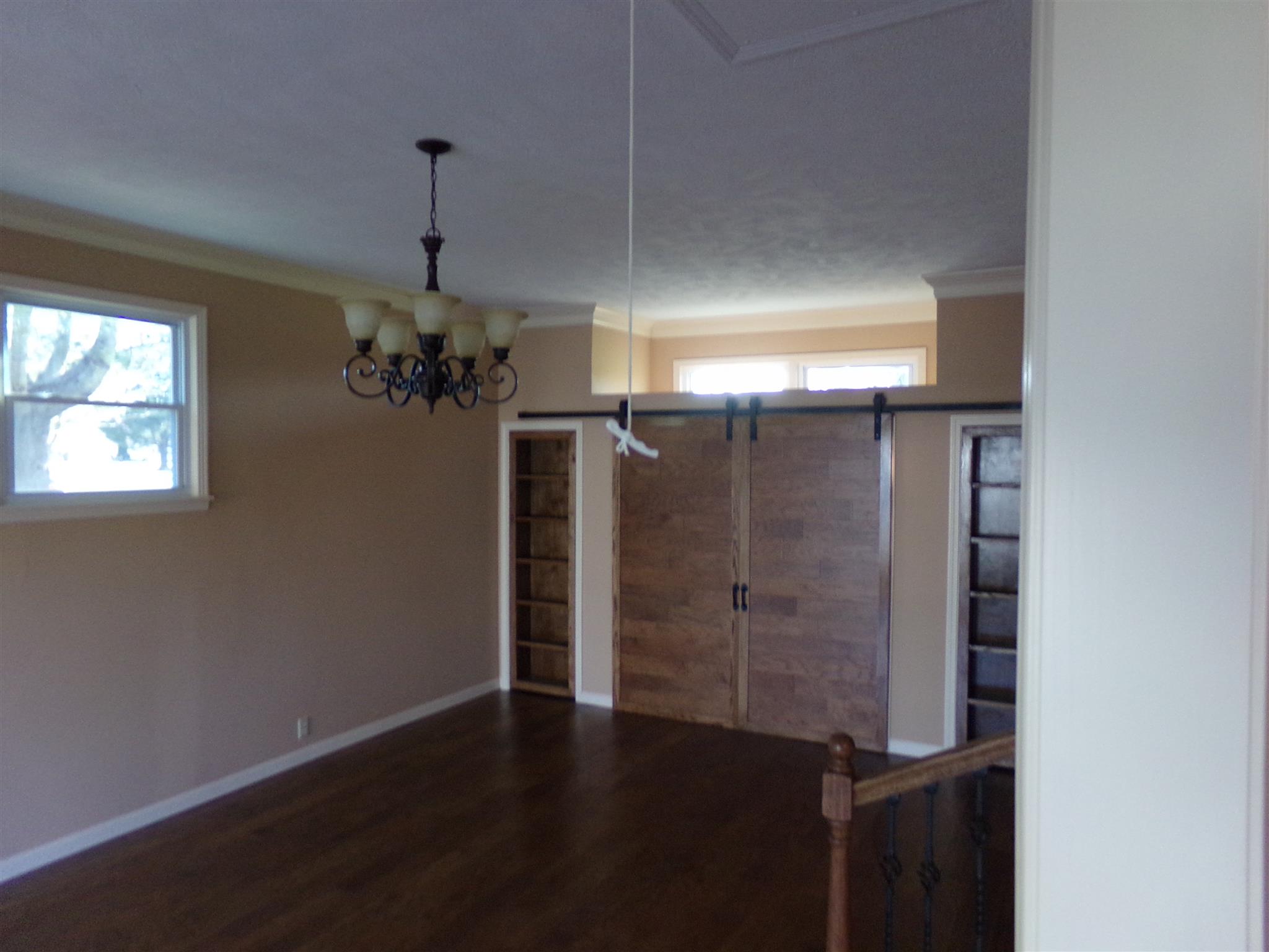213 Airport Road Portland, TN 37148 - Photo 6 of 16 a view of a chandelier in a room