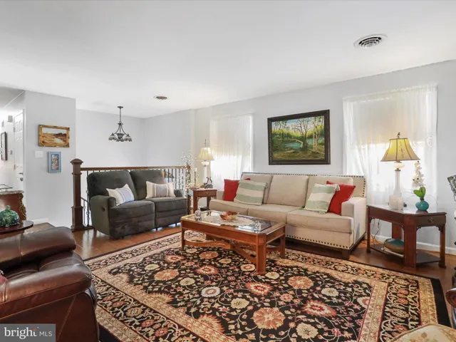 a living room with furniture and a couch