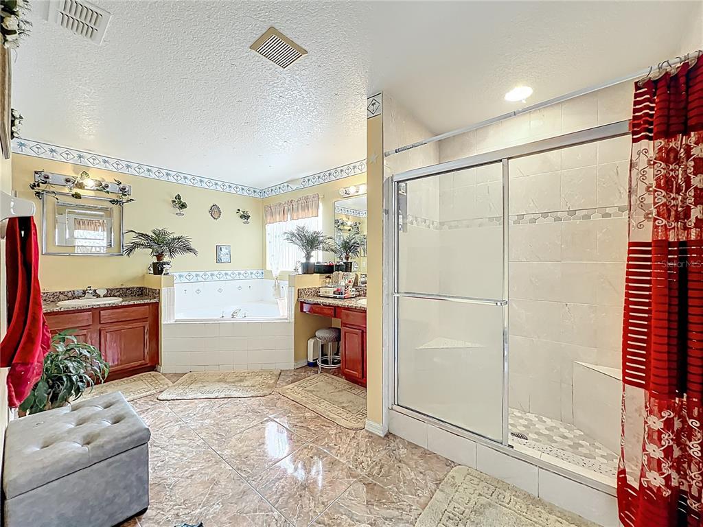 7939 Riffle Lane Orlando, FL 32818 - Photo 26 of 52 a view of kitchen with furniture and refrigerator