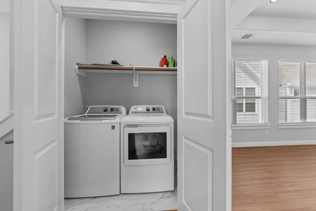 a utility room with dryer and washer