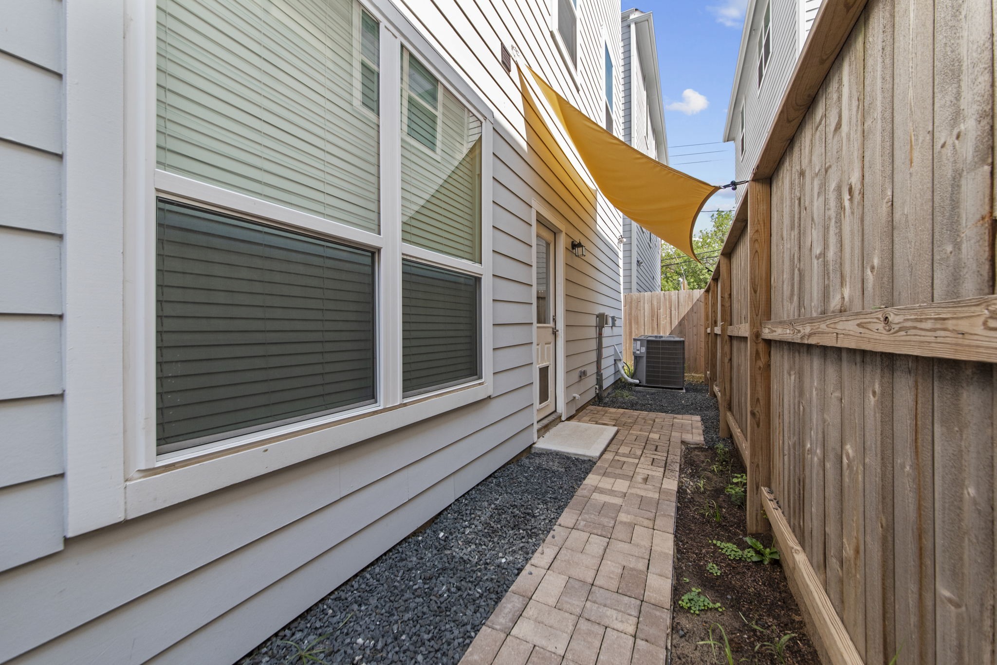 623 Link Road Houston, TX 77009 - Photo 22 of 22 a view of a house with a door and a window
