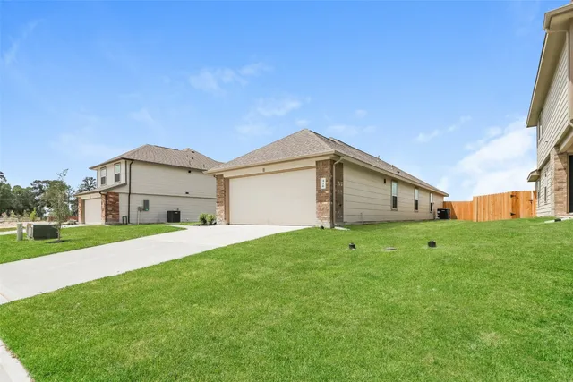 a house view with a garden space