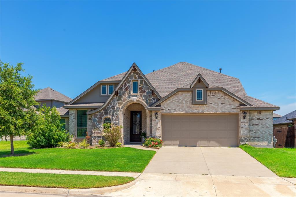 front view of a house with a yard