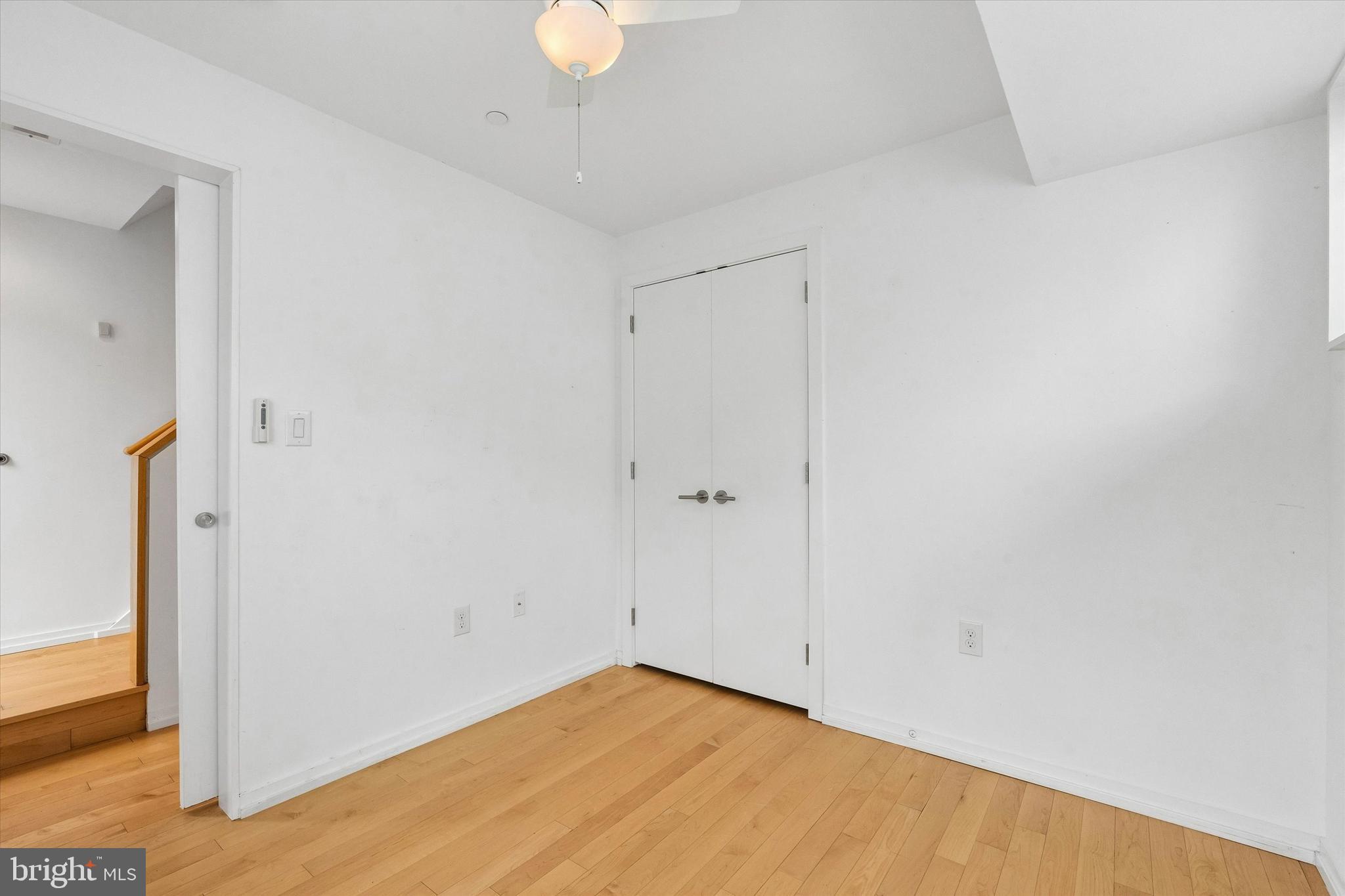 936 North Leithgow Street Philadelphia, PA 19123 - Photo 16 of 40 a view of a room with wooden floor and bathroom