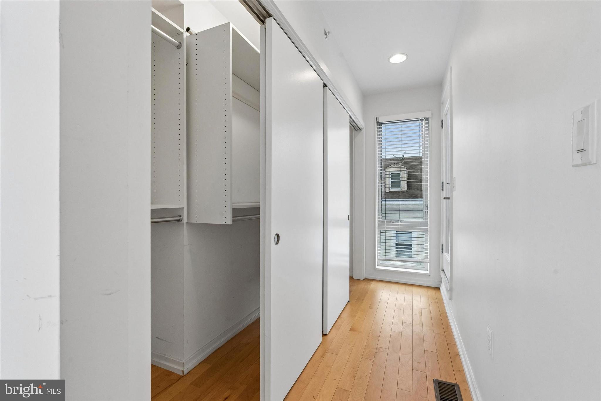 936 North Leithgow Street Philadelphia, PA 19123 - Photo 27 of 40 a view of hallway with closet and wooden floor