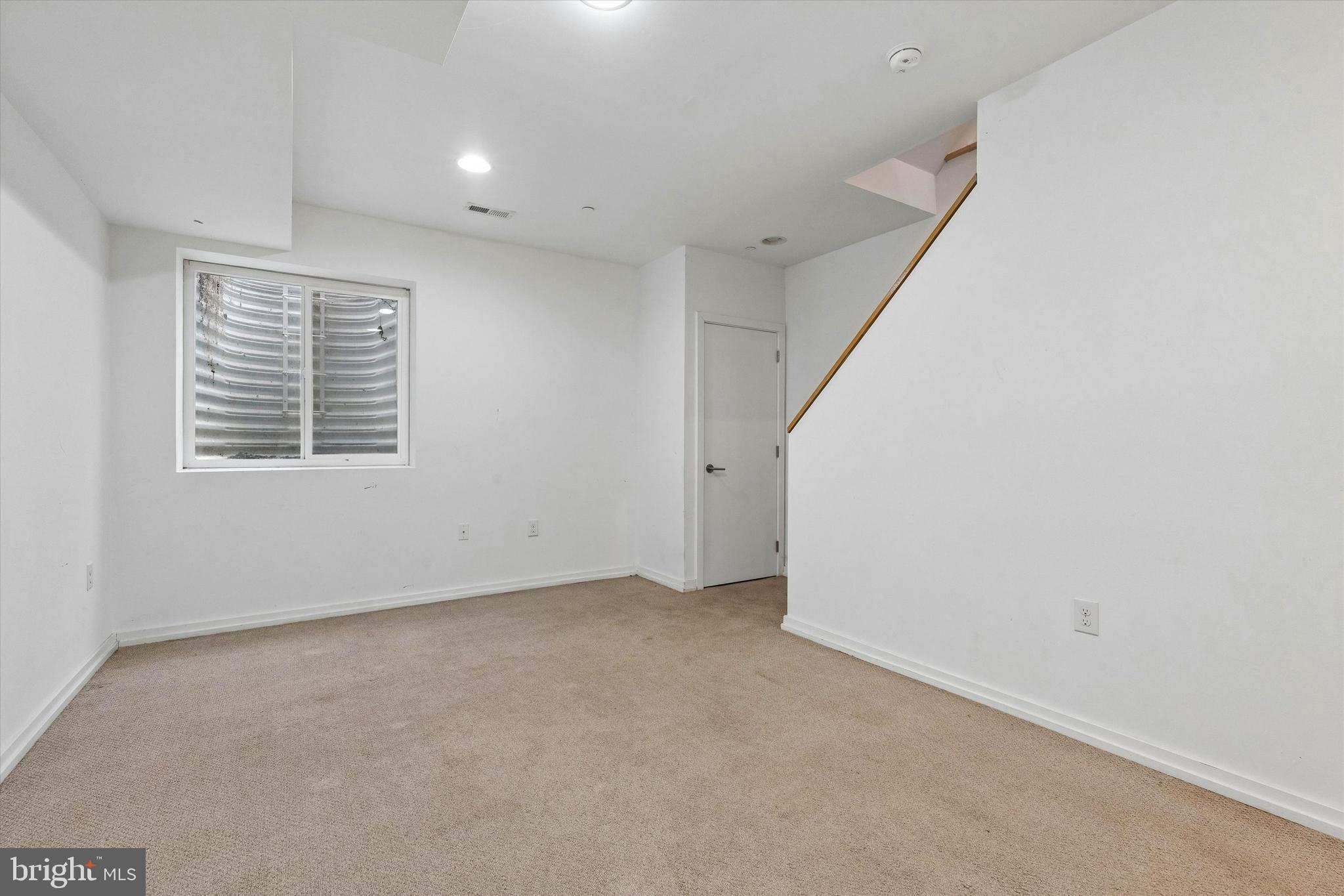 936 North Leithgow Street Philadelphia, PA 19123 - Photo 32 of 40 a view of an empty room with a window