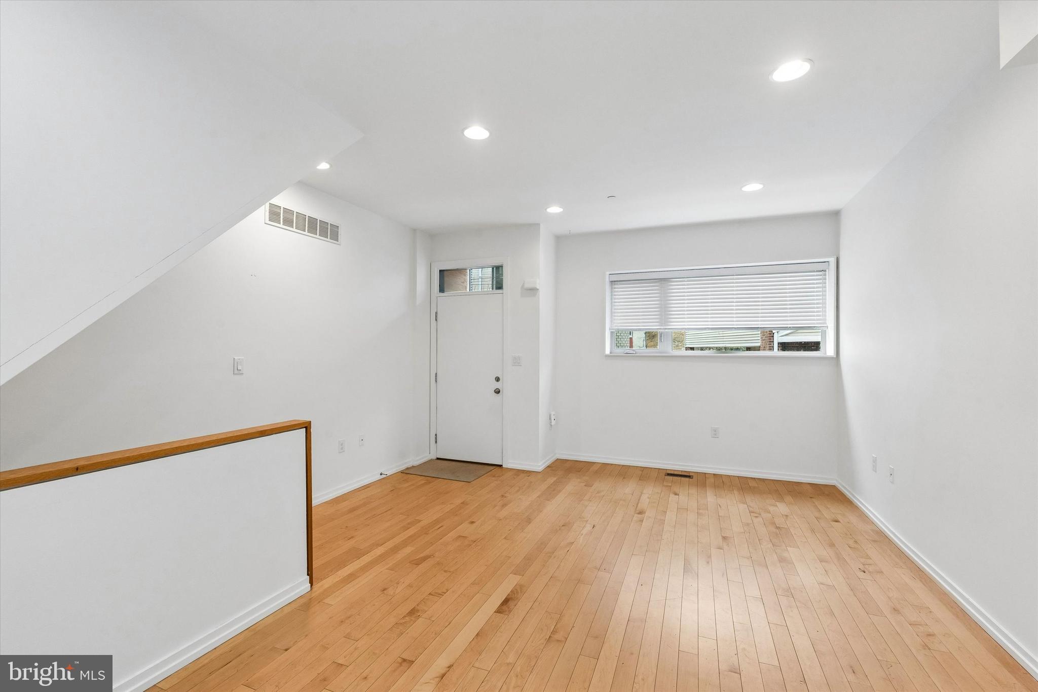 936 North Leithgow Street Philadelphia, PA 19123 - Photo 7 of 40 a view of empty room with wooden floor