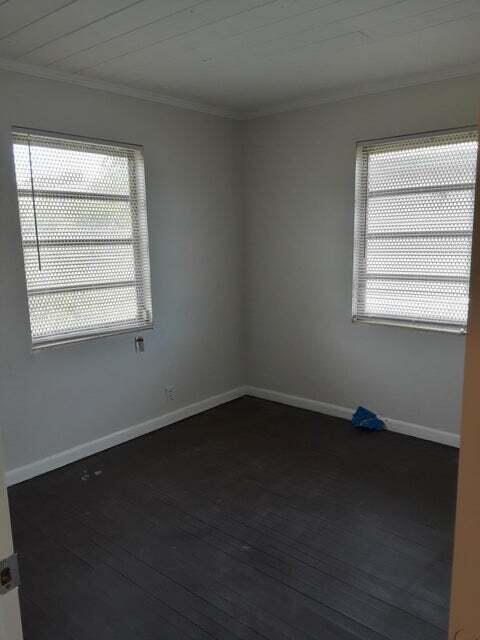 1340 West 33rd Street Riviera Beach, FL 33404 - Photo 8 of 11 an empty room with a window