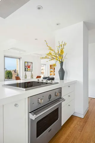 a picture of a room with a cabinet