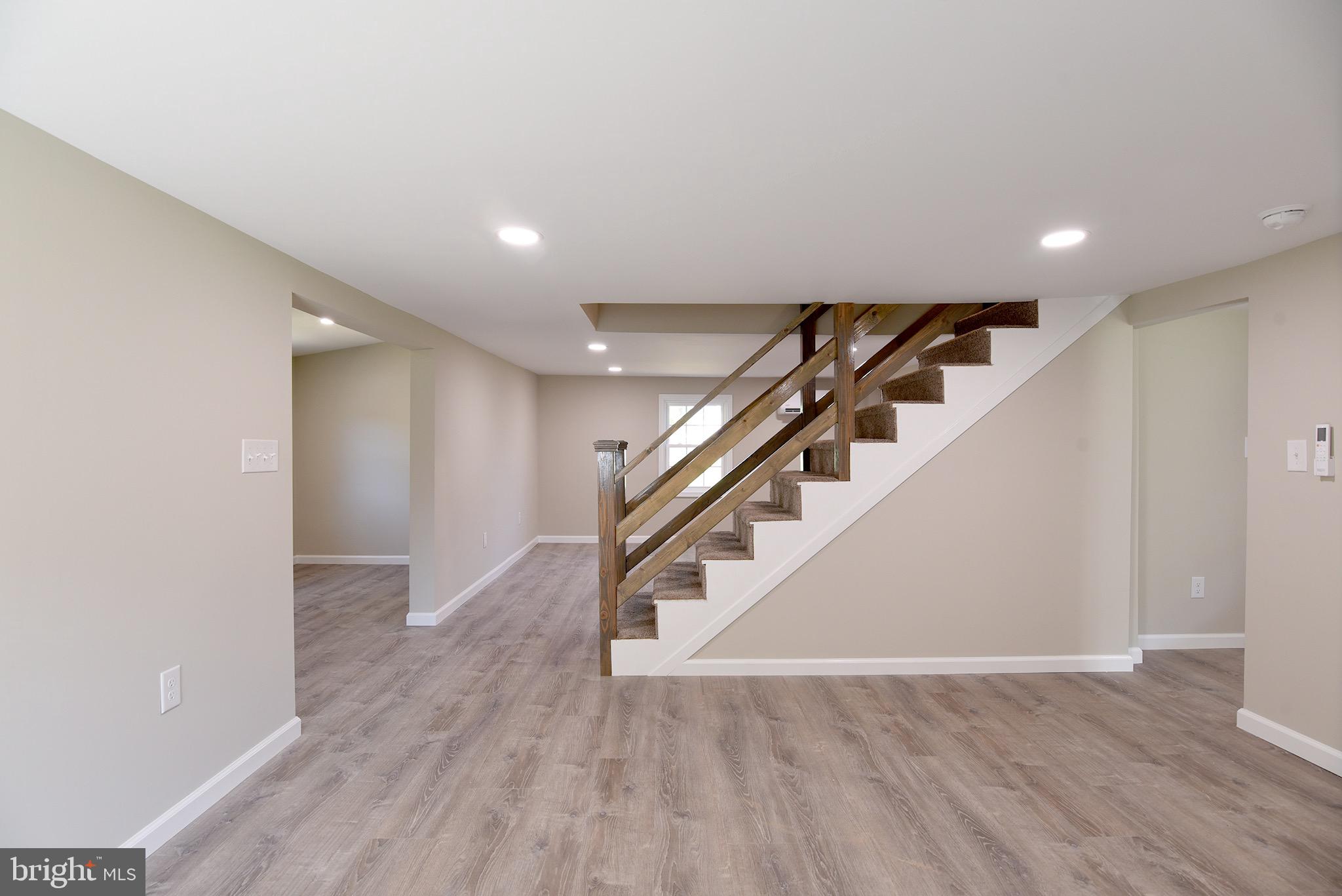 8833 Georgetown Road Chestertown, MD 21620 - Photo 18 of 47 a view of entryway and hall with wooden floor