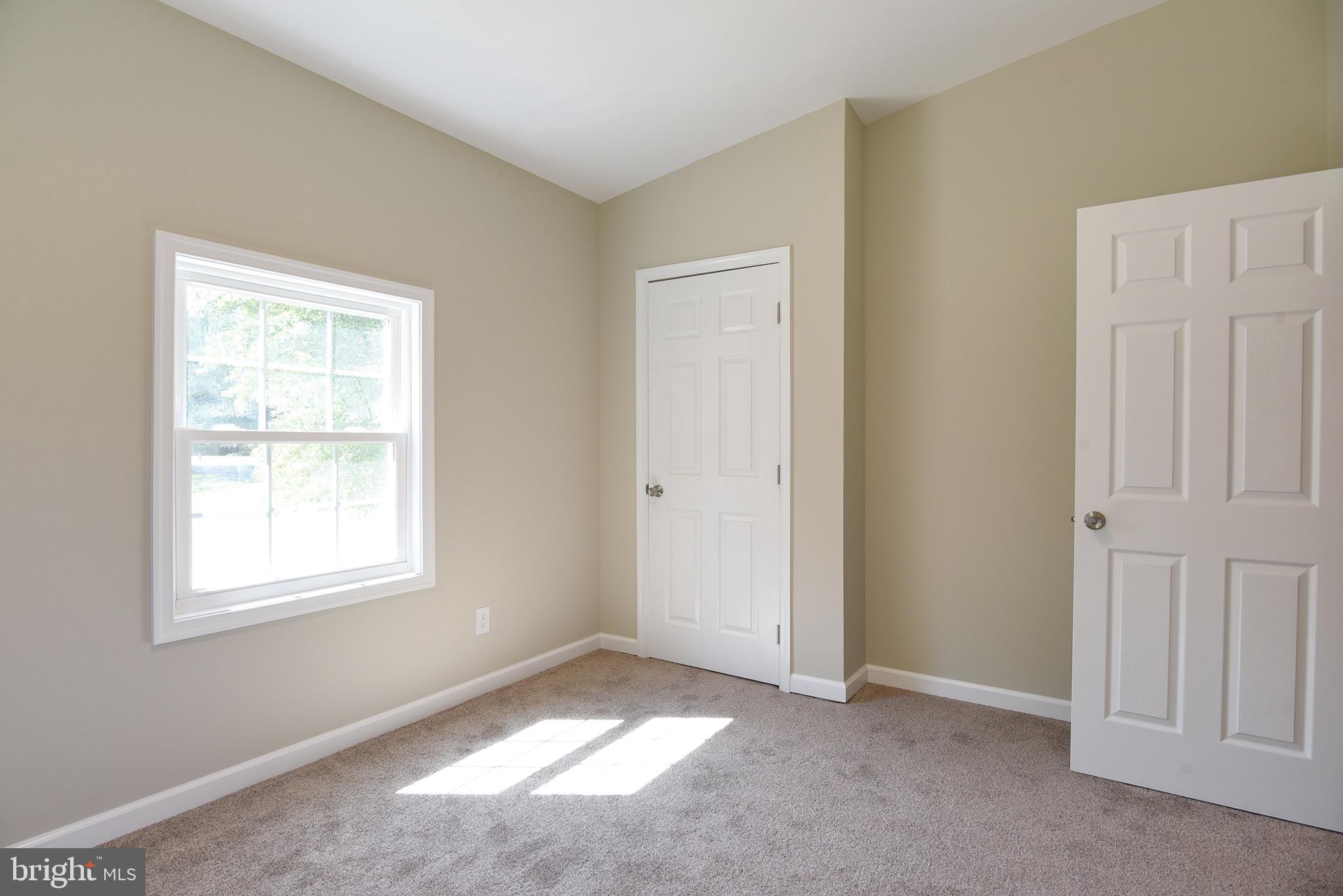 8833 Georgetown Road Chestertown, MD 21620 - Photo 24 of 47 an empty room with windows
