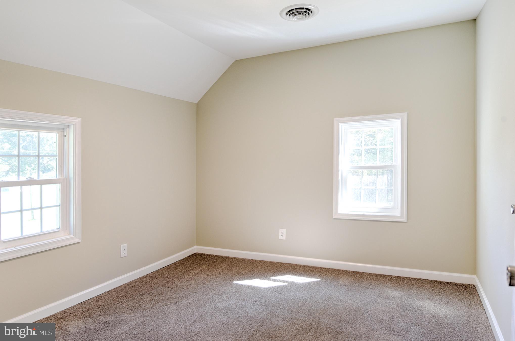 8833 Georgetown Road Chestertown, MD 21620 - Photo 30 of 47 an empty room with a window