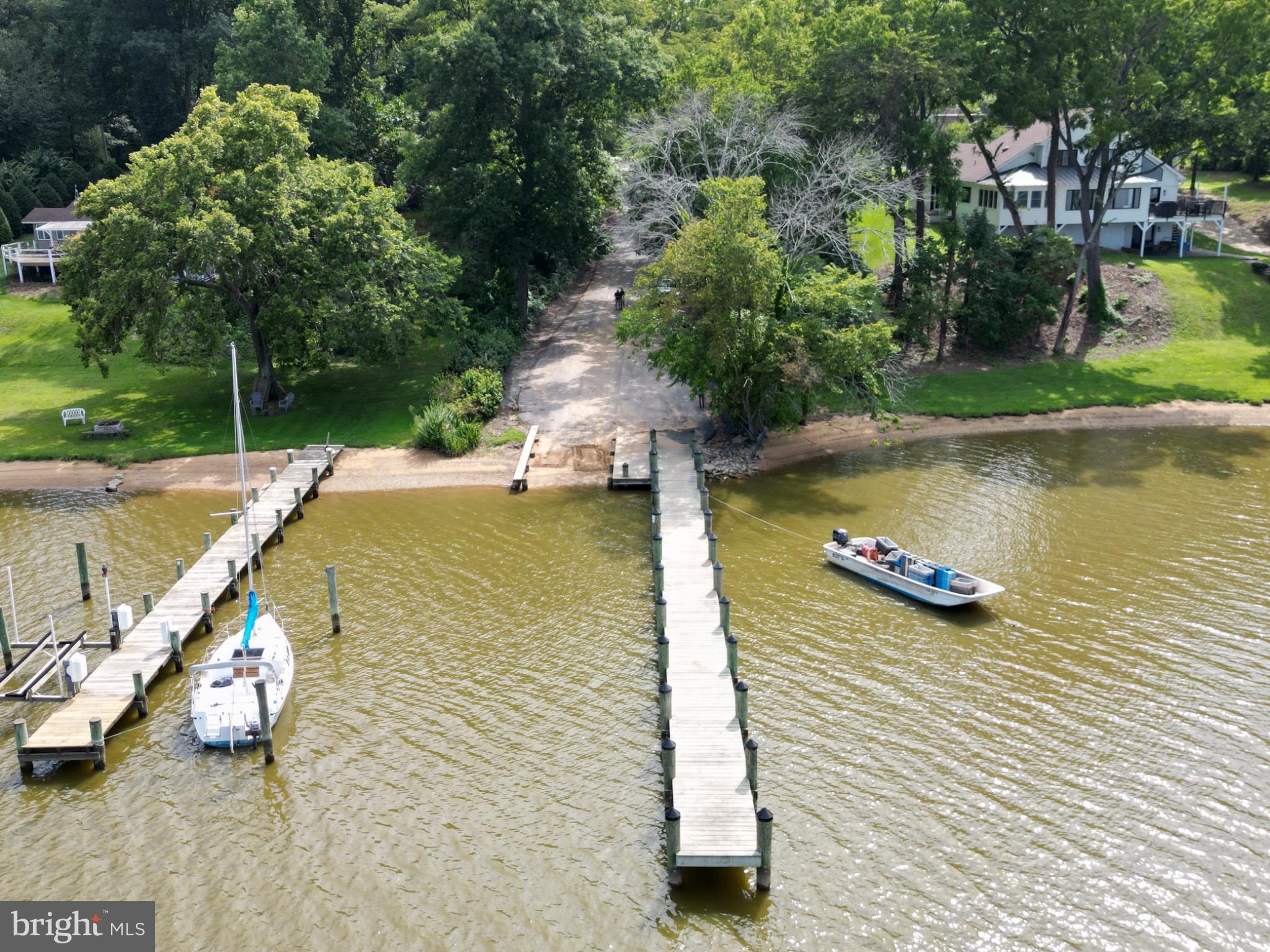 8833 Georgetown Road Chestertown, MD 21620 - Photo 37 of 47 a view of a lake with a yard