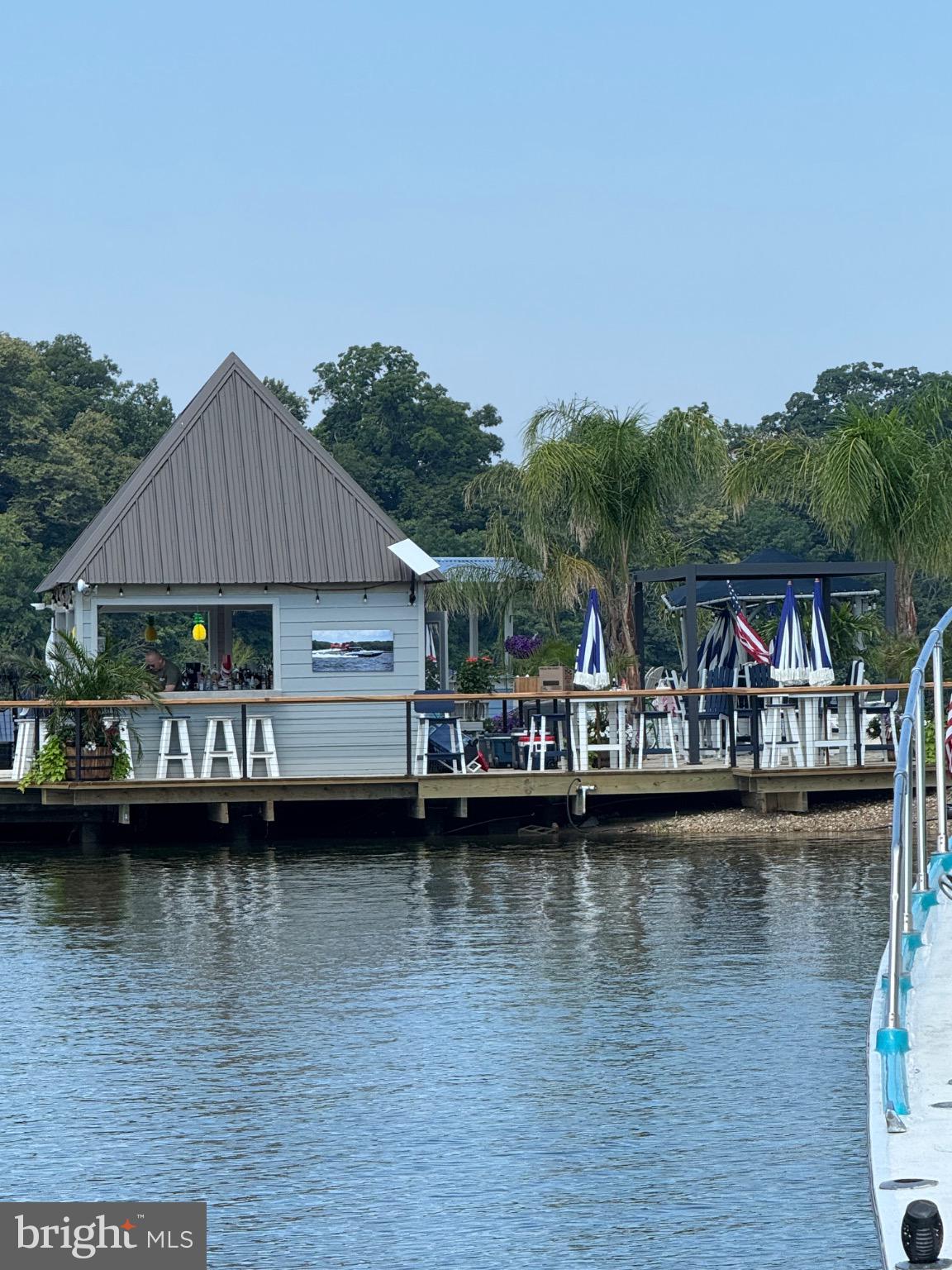 8833 Georgetown Road Chestertown, MD 21620 - Photo 41 of 47 a view of a lake with a large mountain and boats